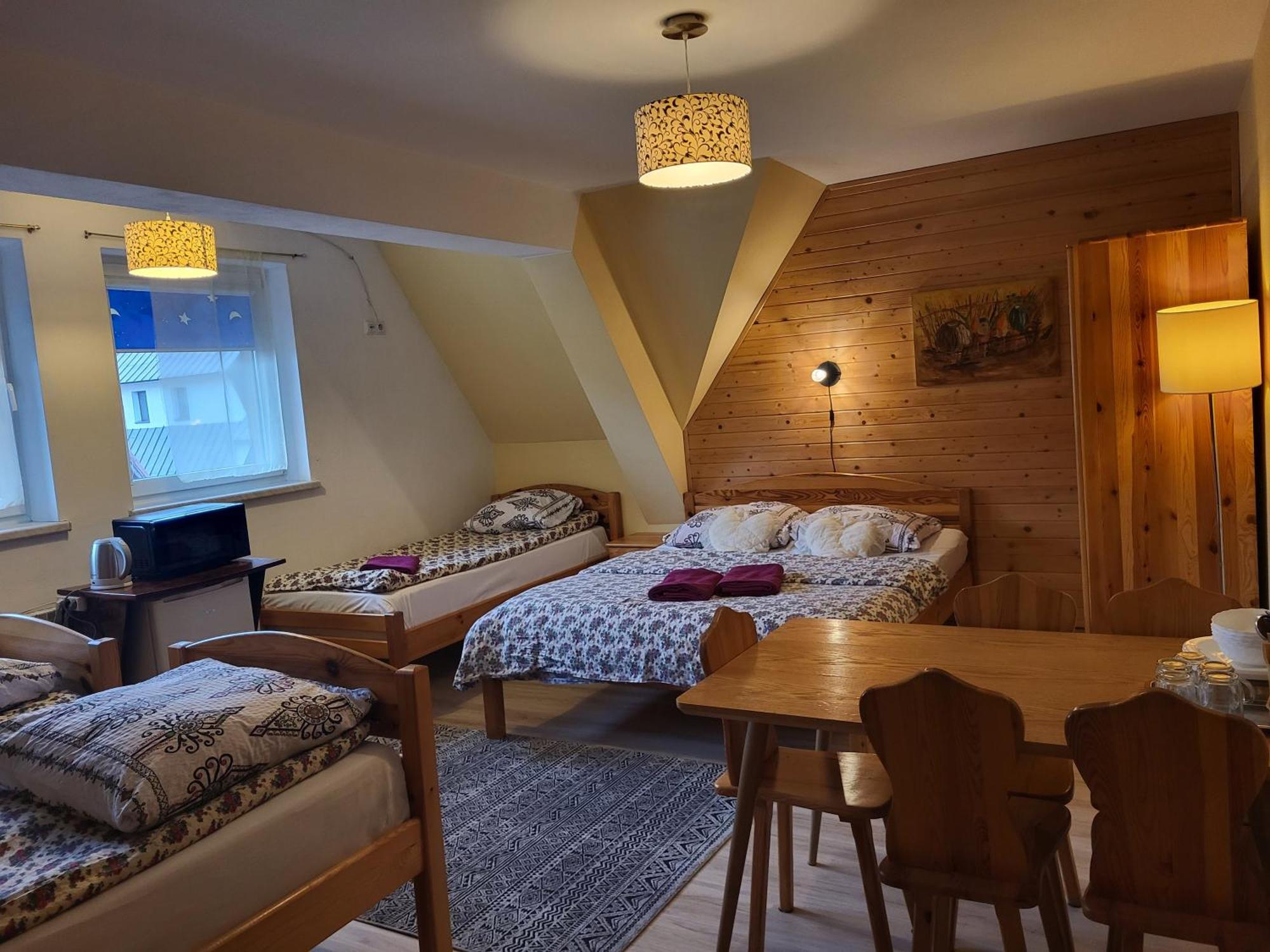 Apartamenty I Pokoje Goscinne Nowita Закопане Номер фото